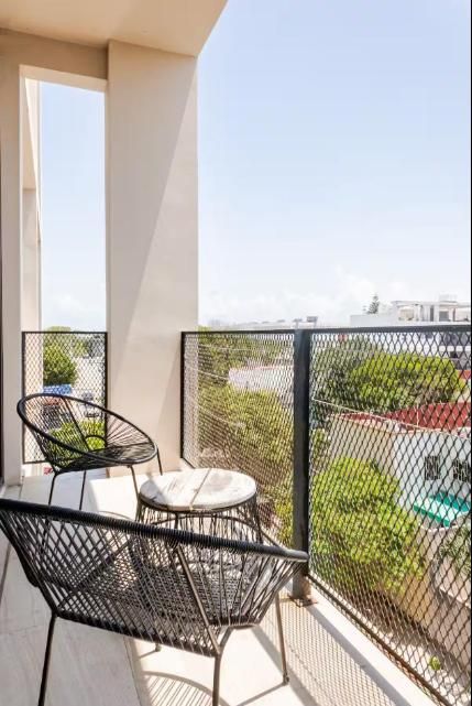 Private balcony with two chairs